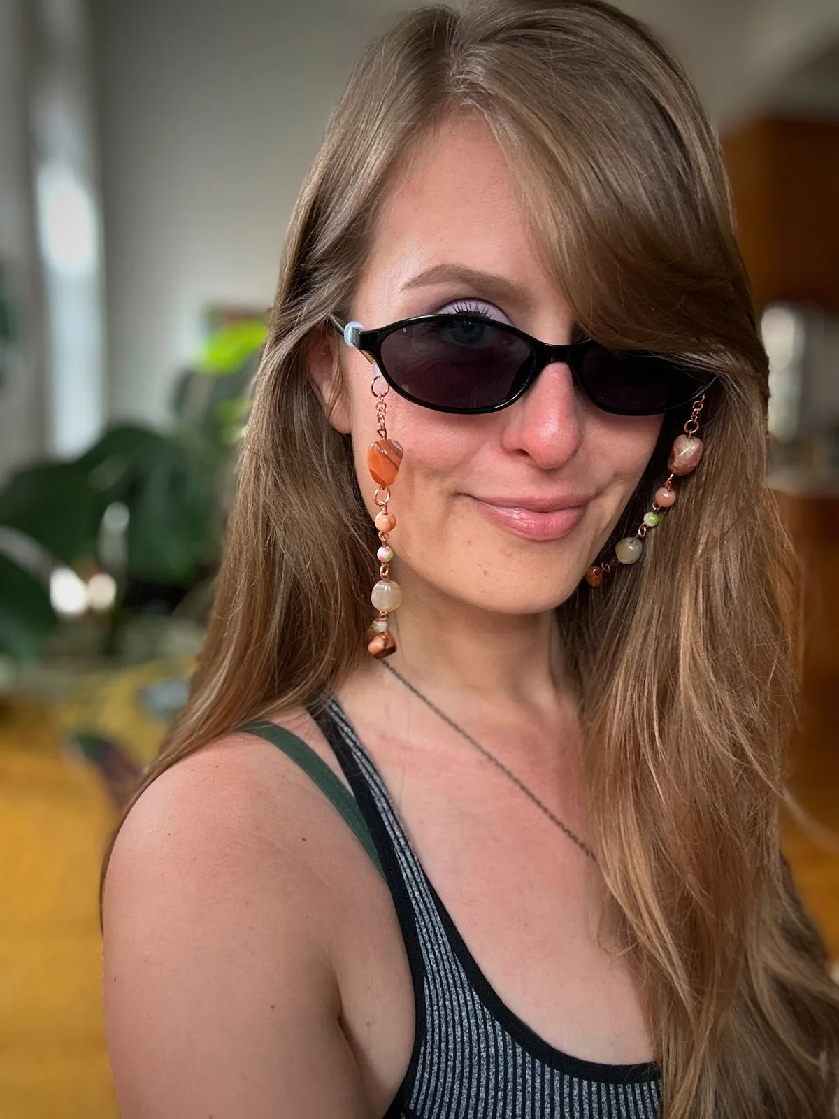 beaded glasses chain worn with sunglasses